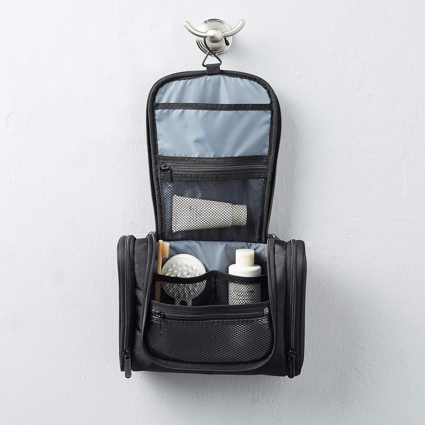 Amazon Basics Travel Toiletry Bag for Men and Women, Hanging Toiletry Bag, Dopp Kit with 2 Side Pockets, Multiple Interior Pockets, Durable 1680D Polyester, Handles Bathroom Spills/Splashes, Black