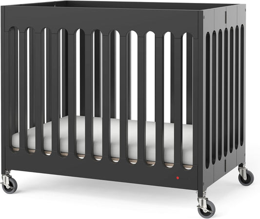 Foundations Boutique Folding Mini Baby Crib - Compact, Portable, Wooden Hotel Crib, Foldable Mini Crib for Baby & Toddlers - Includes 3" Foam Mattress, Ebony