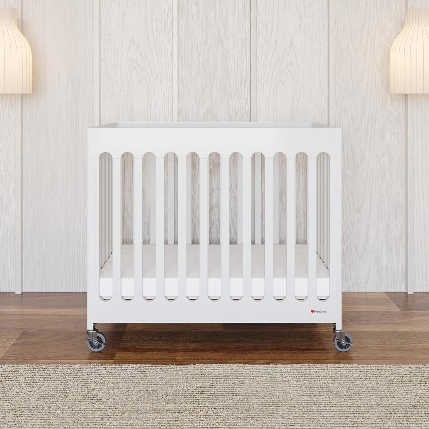 Foundations Boutique Folding Mini Baby Crib - Compact, Portable, Wooden Hotel Crib, Foldable Mini Crib for Baby & Toddlers - Includes 3" Foam Mattress, White