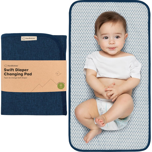 KeaBabies Portable Diaper Changing Pad, Easy Wipe Clean - Foldable Waterproof Baby Changing Mat for Diaper Bag, Compact, Lightweight, 25x13 Baby Changer Travel Essential, Machine Washable (Navy Blue)